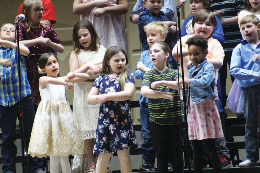 Second graders performed "Check It Out (It's About Respect)," "The Banana Boat Song" and "The Crocodile Smile."
