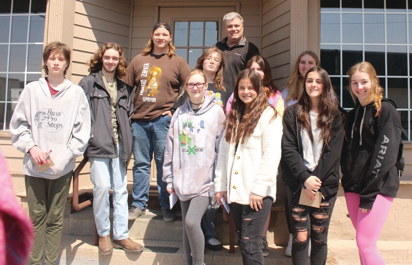 West Harrison students pictured outside of the Times-News office with sports editor Matt Gengler.