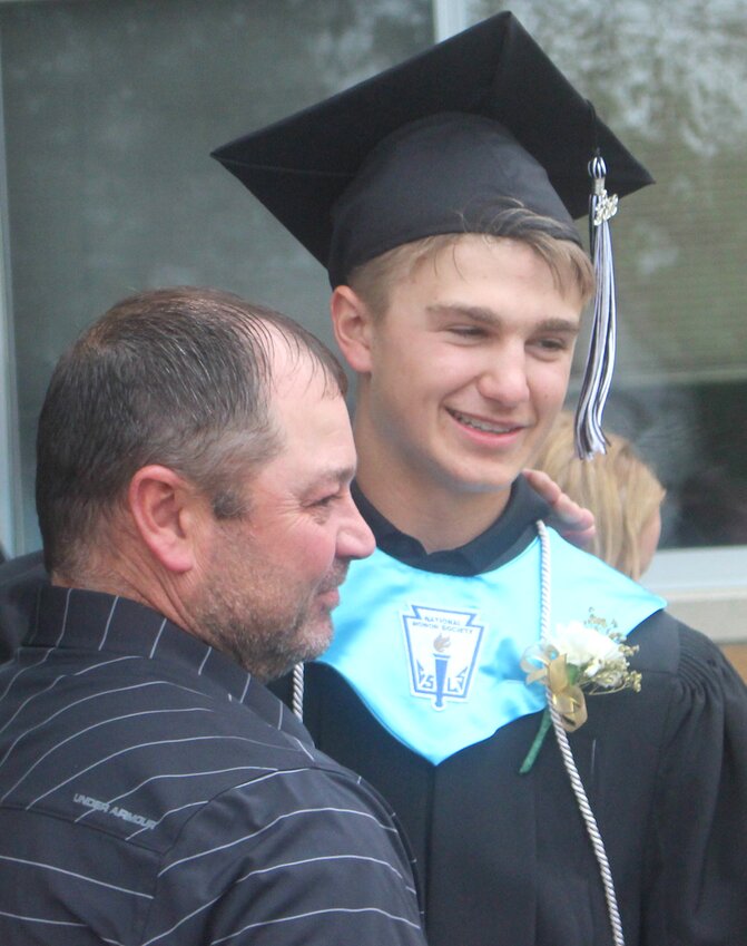 West Harrison's Brady Melby is all smiles after the High School graduation ceremony on May 14 in Mondamin.