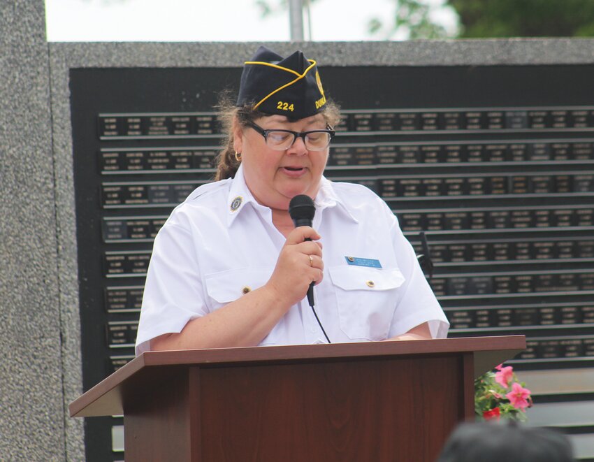 American Legion Post #224 Commander Jen Miller speaks at Pleasant Hill Cemetery during Dunlap's Memorial Day Services on Monday.