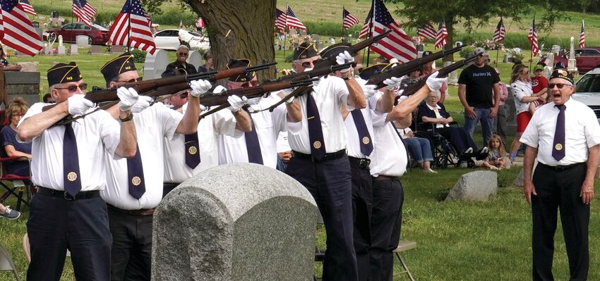 WOODBINE MEMORIAL DAY SERVICE:  The Woodbine American Legion Weiss Post 143 prepare to fire during the Memorial Day Services held at Woodbine. They include, from left, Ron Allen, Michael Dorland, Dwight Mills, Reggie Stewart, Harley Mether, Chris Lenning, and Tony Bantam.