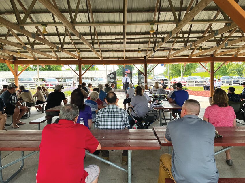 A crowd gathered at City Park for the Missouri Valley Memorial Day service, with American Legion Post #337 leading the service. Post Commander Brad Westercamp is pictured speaking in front of the crowd.