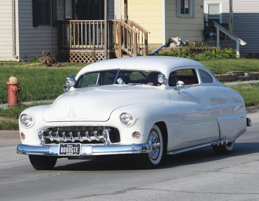 Classic cars scooped the Erie St. loop on Saturday night ahead of the Eagles Club Car Show on Sunday.