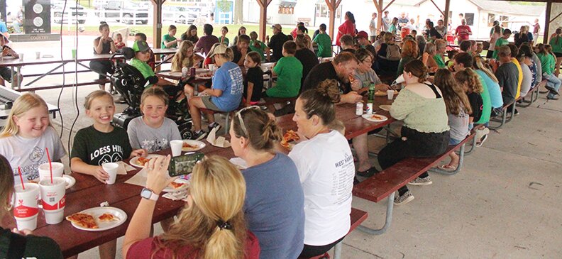 The 4-H pizza party is an event that many 4-H youth look forward to during the fair and is a fun opportunity to visit with friends and enjoy a delicious treat.