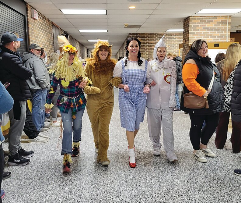 Even the staff at Logan-Magnolia Elementary School joined the fun dressing in costumes for the Annual costume parade.