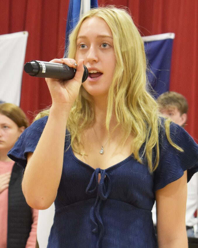 Boyer Valley senior Lauren Malone performs the Star Spangled Banner at the start of the Veterans Day ceremony held on Nov. 10 in Dow City.