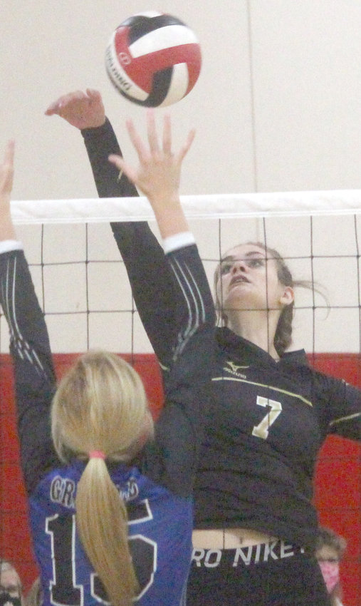 Woodbine's Whitney Kuhlman (7) knocks the ball past the Griswold defender at the Sept. 5 Missouri Valley Invitational.