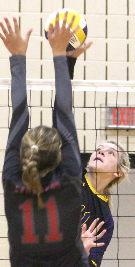 Logan-Magnolia's Ruby Nolting slams the ball past the Missouri Valley defender in last week's Western Iowa Conference battle. The Panthers will host Underwood on Thursday.