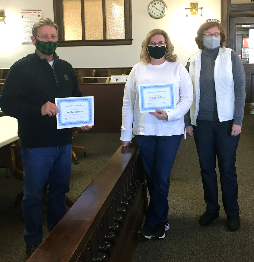 Harrison County Supervisor Walter Utman, left, was awarded a Certificate of Appreciation for 10 years of service to the county. Sheila Phillips, center, was awarded one as well for 10 years of service. Harrison County Auditor Susan Bonham, right, awarded the certificates at the Jan. 21 regular Harrison County Board of Supervisors meeting.