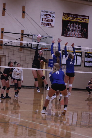 Brylei Clausen goes up for a hit against Woodbury Central on Aug. 31.