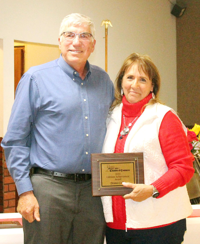 Chamber Treasurer Judy Holcombe awards Dennis Collier the Lifetime Achievement Award to thank him for all the years of hard work he has put into making Missouri Valley the best it can be.