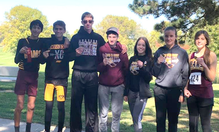 The MVAOCOU cross country team had a lot of success at the Western Valley Conference meet on Saturday, Oct. 16. Joey Koithan placed second in the middle school race and Kael Hamann was second in the high school boys race. Ethan Reed, Justin Dorale, Hannah O'Connell, Lauren McMillen, and Olivia Beeson all earned All-Conference honors. See complete recap from the conference meet on page x.