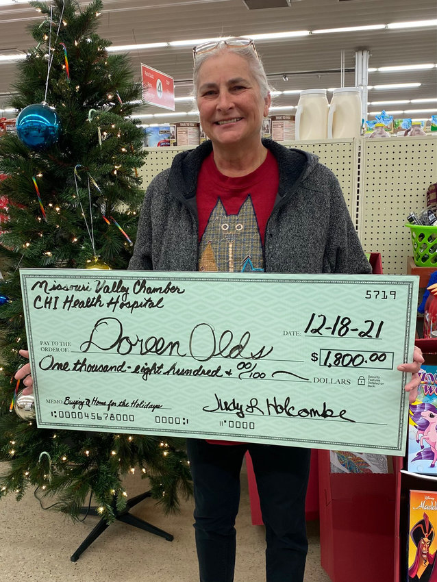 The winner of the $1,800 Buying at Home for the Holidays prize is Doreen Olds.