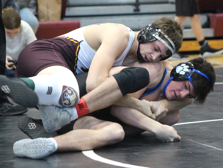 MVAOCOU hosted the Western Valley Conference wrestling tournament on Saturday, Jan. 15. Kolby Scott won the conference title at 170 lbs. Pictured is Scott pinning Woodbury Central's Kyan Schultzen in 23 seconds. See complete results and pictures from the conference tournament on Page 10.