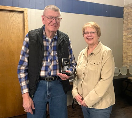 The Ute Community Club honored Don Petersen, who has retired as the Treasurer of the club after 68 years. Pictured with Don Petersen is Community Club Secretary Leesa Kuhlmann.