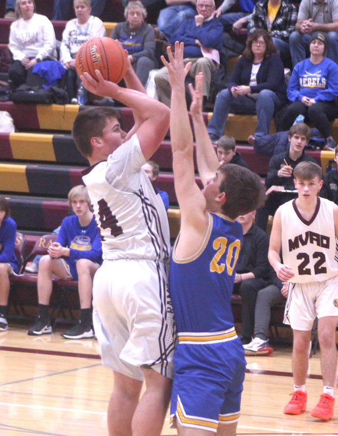 Jace Henderson goes up for a shot against Westwood.