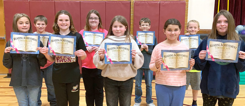 These students make up the 3rd Quarter Top Ten Readers.&nbsp; They had the most AR points during the 3rd quarter.&nbsp; Front Row: Isabella Treusch, Sylvia Forbes, Raylyn Kelm, Sadie Cameron, and Abigail Hogan.&nbsp; Back Row: Landon Schofield, Natalie Streck, George Brown, and Todd Jenkins.&nbsp;Missing from photo was Charley Bahrke.&nbsp;