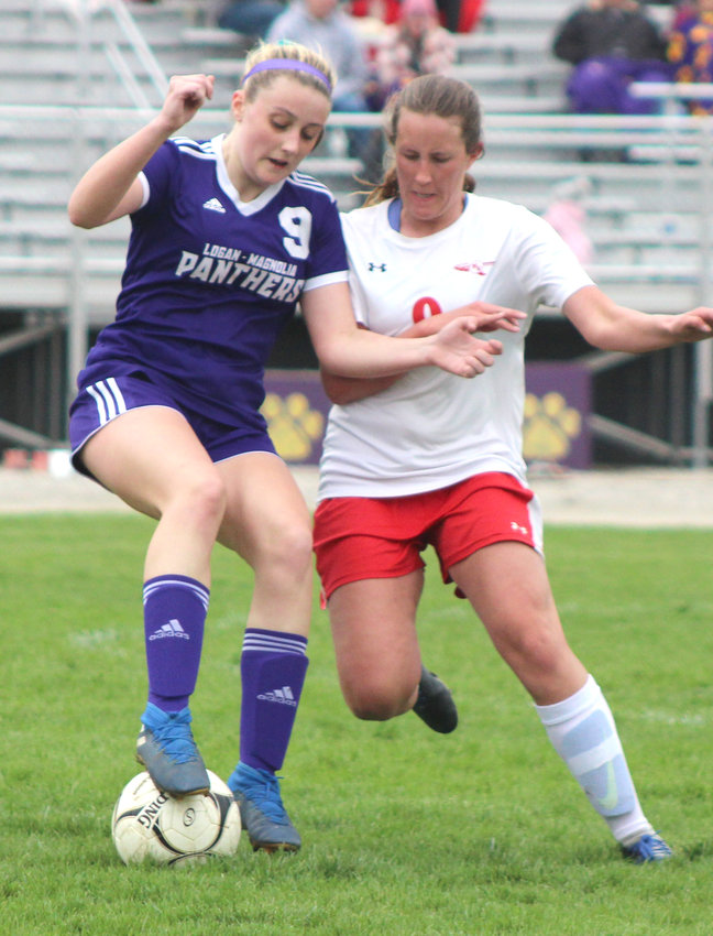 Logan-Magnolia's McKenna Witte battles for possession with Missouri Valley's Bailey Koyle on May 3 in Logan.