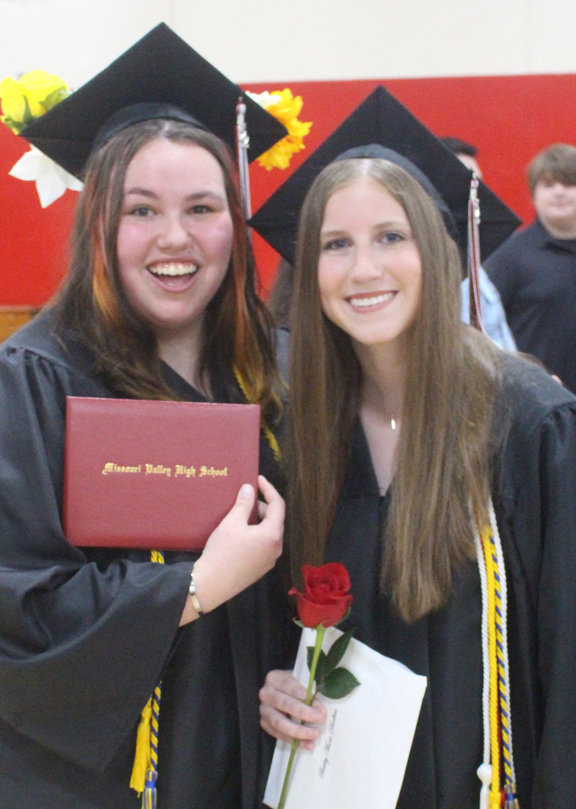 Missouri Valley Graduation: Seniors Mariah Pleskac and Bailey Divelbess are all smiles after the graduation ceremony on May 15.