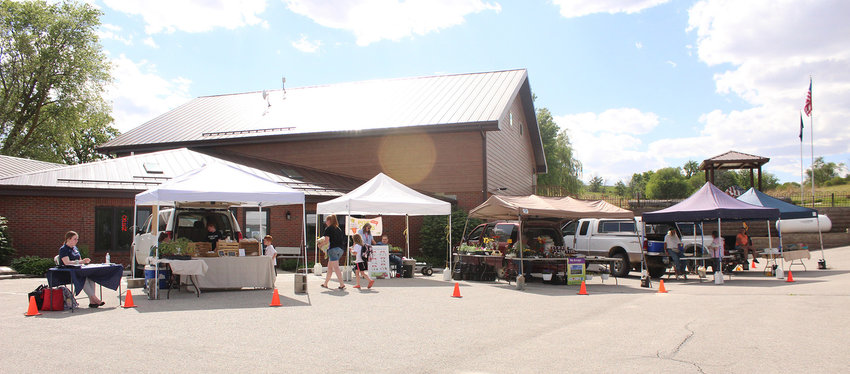 Many booths with a variety of fresh producs were at last week's Farmer's Market.