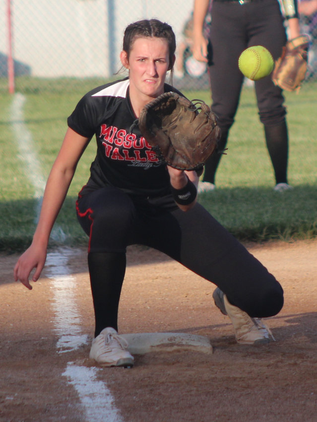 Missorui Valley's Maya Contreraz looks the bal into the glove during Western Iowa Conference action against Logan-Magnolia on June 2 at Missouri Valley.