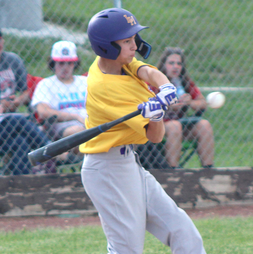 Logan-Magnolia's Wyatt Hawkins connects with the baseball in Western Iowa Conference action at Missouri Valley on June 2.