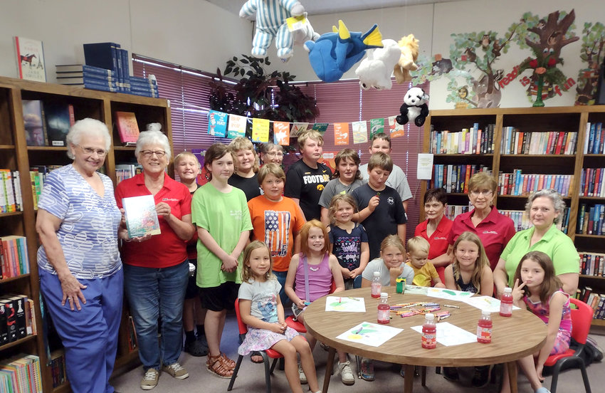 The  Crawford County Farm Bureau  Agriculture in the Classroom Committee and Loess Hills Agriculture in the Classroom partner up to teach library patrons &quot;How To Grow a Monster&quot; at the Charter Oak Library's first summer program..