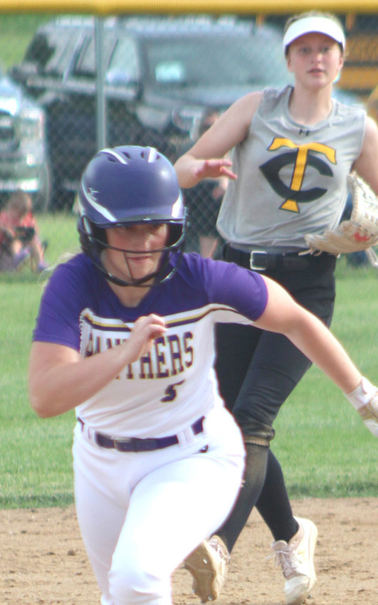 Logan-Magnolia's Kali Collins takes off toward third base in Western Iowa Confernece play against Tri-Center on June 10.