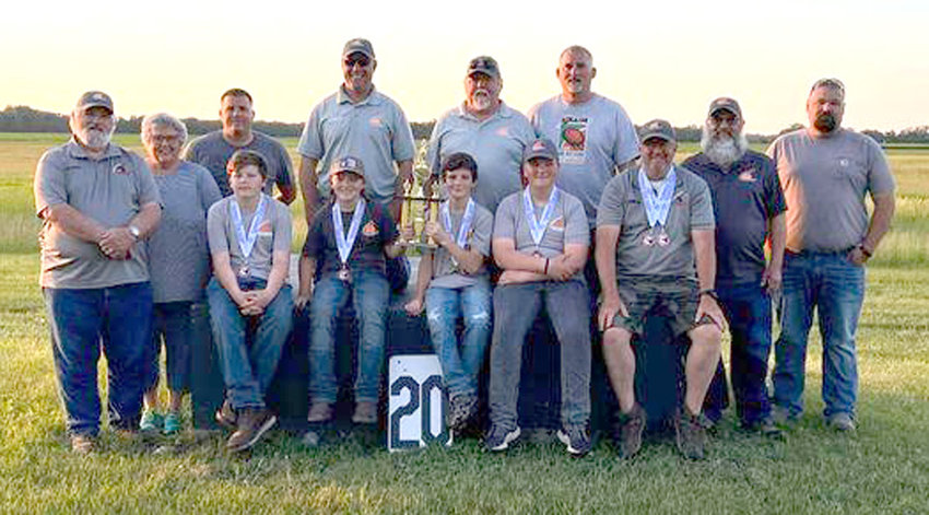 Shown in this photo is the Loess Hills Youth Shooting Sports Beginners squad who participated at the Iowa State Trap Shootiing Championshps held in Cedar Fals this past week.  The beginners squad include in the front row, from left, Case Allmon, Ryker Nolting, Jett Straight, Xander Pitt, and Coach Jack Winther.  Back row includes Coaches and Board Members, Rex Gochenour, Deb Gochenour, Curtis Wohlers, Jeff Straight, Rod Ortner, Brent Wohlers, Dave Weiner, Jason Fisher.