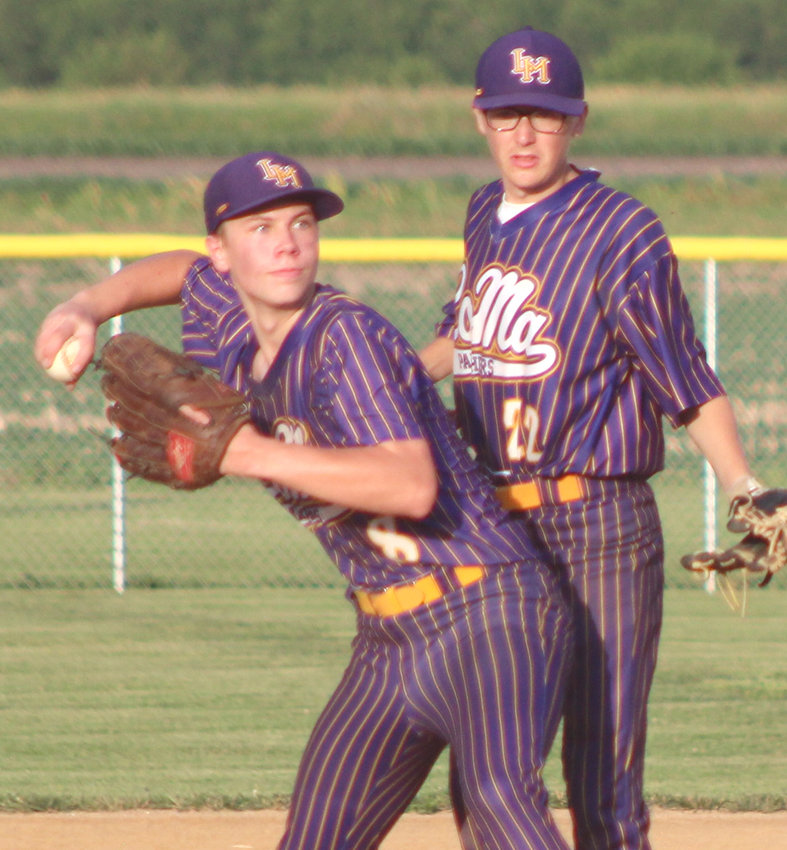Logan-Magnolia's Jason Kastner makes the throw to first base, as Lyrick Stueve backs up the play in action from earlier this season.
