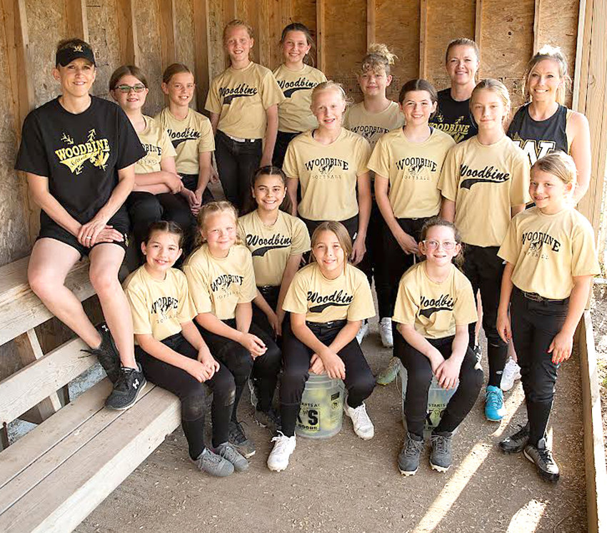 Members of the Woodbine Tigers Fourth/Fifth grade softball team include in the front row, from left, Zoanne Boettger, Charlotte Hendren, Brooklyn Valles, Isabella Gayton, Macy Androy, Joelle O'Banion.  Middle row, Jaelynne Nelson, Keaton Owens,Tesla Wagner.  Back row, Kinsley Johnston, Vanessa Blum, Avery Coenen, Eliza Moores, Celeste Sherer.  They were led by  Coach Jen Nelson, Coach Amanda Seda, and Coach Rebecca Blum.