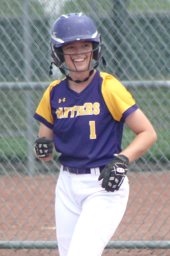 Logan-Magnolia's Erikah Rife (1) is all smiles after her first hit at the 2022 Iowa High School State Softball Championships at the Rogers Sports Complex in Fort Dodge.