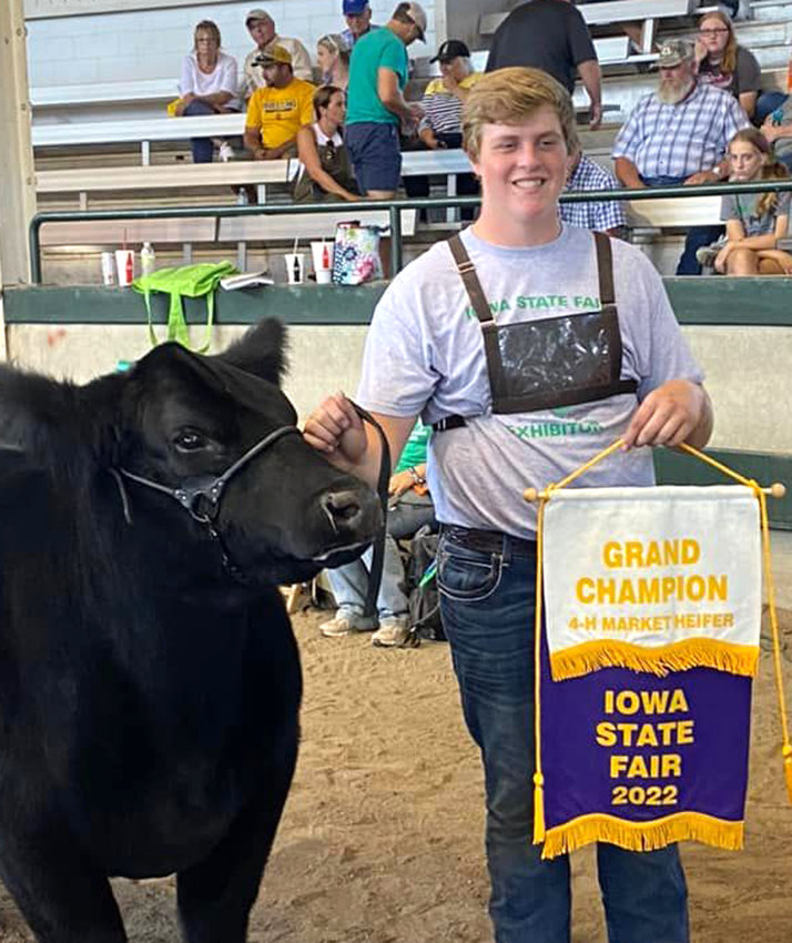 Jax Pryor of hte Hawkeye Ramblers (Woodbine) took home Grand Champion Market Heifer at the 2022 Iowa State Fair on Aug. 17 in Des Moines.  He is the son of Adam and Melanie Pryor, and grandson of Randy and Cindy Pryor, and Phil and Sherill Lubbers, also of Woodbine.