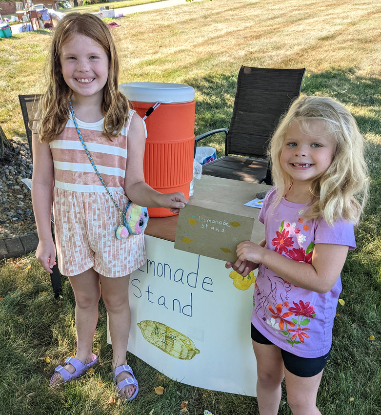 Morgan and Brooke were really excited to have a lemonade stand.