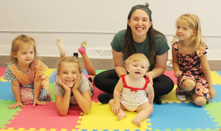 Here you can see some Music Together participants pose for a photo after a fun class. Starting on the left is Brinley Baker, Adelynn Beckner, Haley Schoenfelder, baby Carrianne Beckner, and Harper Staska.