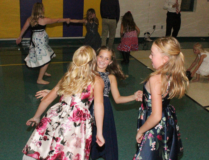 Little girls and their dads had the chance to dance the night away at Logan-Mignola&rsquo;s first ever Father, Daughter dance.