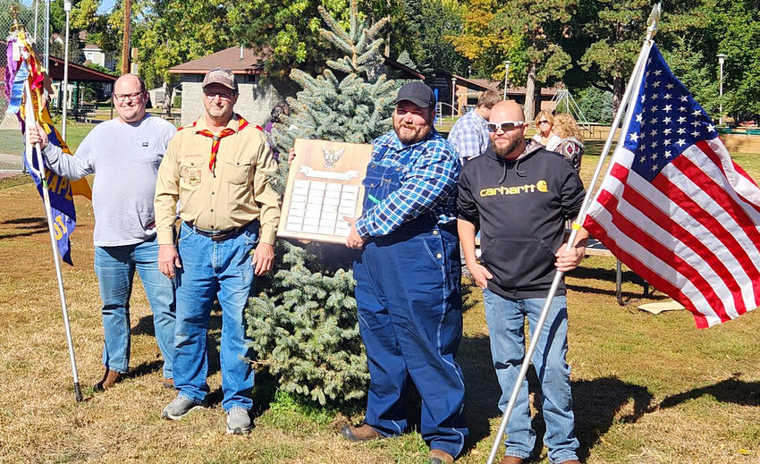 Nicholas Mauch, Ray Rosburg, Andy South, and Matt Thompson were on hand for the tree dedication in the Mapleton City Park to honor the late Boy Scout leader Dennis South.