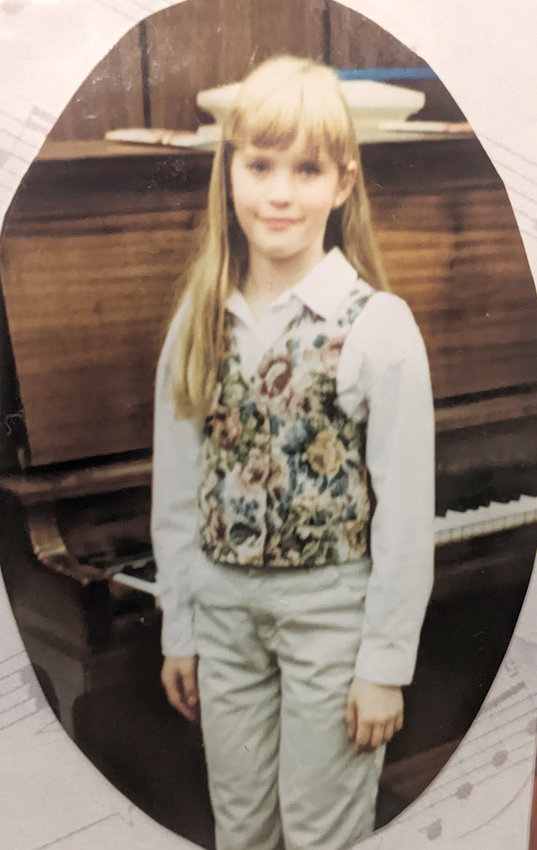This is a picture of me before one of my piano recitals.