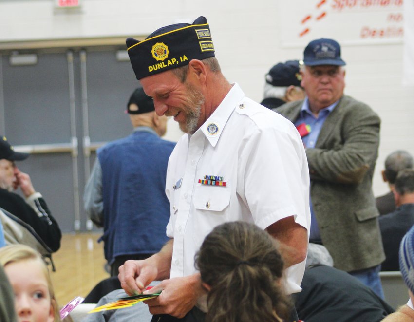 Veteran Craig Miller was all smiles while talking with students and receiving thank you cards.