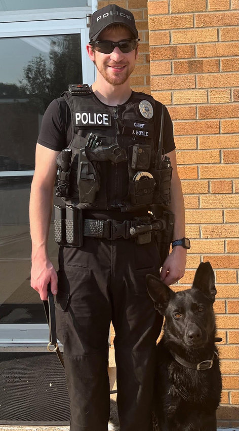 Mapleton Police Chief Alex Boyle with K9 Officer Trigger.