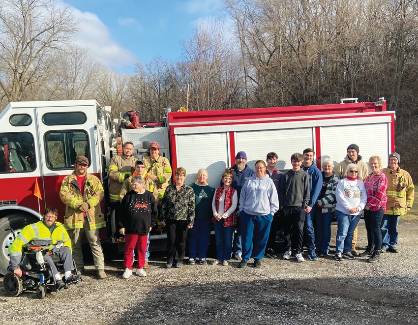 The Harrison County Food Pantry received help from multiple sources, including the Missouri Valley Fire Department.
