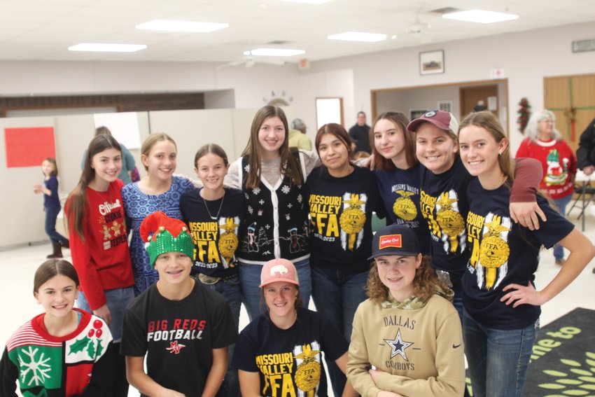 Several student volunteers helped out at the Little Christmas Store. BACK ROW: Abbie Gutzmer, Sarah Leusink, Tylee Koyle, Hannah Gutzmer, Marisa Reyes, Kaelee Baker, Ashley Leusink, Devon Koyle. FRONT ROW: Ellie Kohl, Mitchell Soetmelk, Bailey Koyle, Toben Lasater.