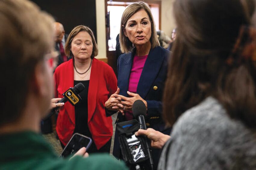 Iowa Gov. Kim Reynolds answers questions from the press on Tuesday, May 16, 2023, at Atlantic City Hall, in Atlantic. Reynolds' office has settled two lawsuits accusing her of &quot;stonewalling&quot; open records requests for a year or more for about $175,000.