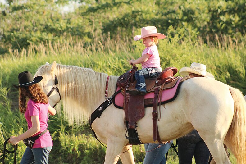 Local Cowgirl Korleigh Mickelsen sat proud in the saddle during the Woodbine Rodeo.