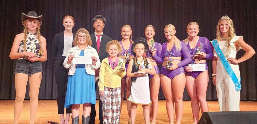 Front Row - Sprouts Winners: 3rd Place, Naomi Mouw; 2nd Place and Monona County Winner Rylan LeFebvre; 1st Place, Adelynn Beckner. Back Row - Senior Winners: Monona County Winner, Jocelyn McFarland; 3rd Place, Claire Hoeg; 2nd Place, Michael Widjaja; 1st Place, Mary Clare Matthews, Ashlyn Herrig, Elli Heiden, and Jordyn Linn. Katie Brenner, the 2022 Monona County Fair Queen was the Emcee..