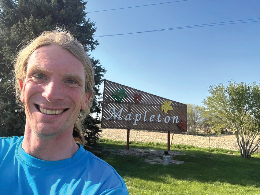 Tyler Sullivan is running in every town in Iowa and writing a poem about each county. He stopped in Mapleton earlier this summer.
