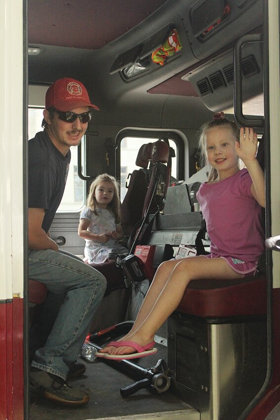 Families had the chance to explore a fire truck at the Logan Public Library&rsquo;s &quot;Touch a Truck&quot; event.