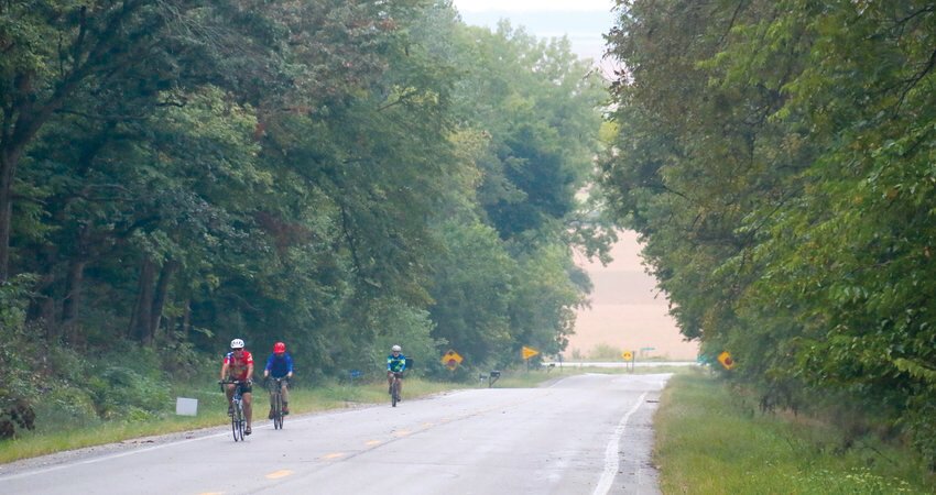 Bikers work to make their way up the hill during the Embrace the Hills ride on Sept. 17, 2022.