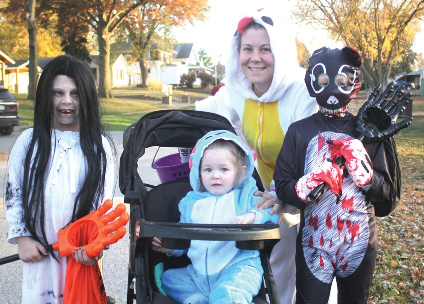 Halloween in Dunlap, 2022: Shown from left, Londyn, Rory and Kinlee Hulscher, with Kayle Fouts.