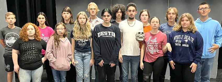 Members of the 2023 Logan-Magnolia Fall Musical include in the front row, from left, Shannon Sieck (Lights Engineer), Maggie Barrett (Grandmother), Abby Bock (Grandmother), Penelope Alvis (Wednesday Addams), Titus Perelman (Gomez Addams), Anaya Drown (Morticia Addams), Olivia Mackey (Alice Beineke).  Back row, Isaac Mackey (Audio Engineer), Savannah Guyett (Stage Crew), Landon Grimes (Addams Family Ancestor), Wyatt Grimes (Uncle Fester), David Andregg (Lurch), Ceci Alvis (Pugsley Addams), Aiden Young (Mal Beineke), Anthony Householder (Lucas Beineke).  Not pictured:  Abigail Poore (Stage Manager), Chay Fraizer (Addams Family Ancestor), Madisyn Andersen (Addams Family Ancestor), Trevin Kurth (Addams Family Ancestor).